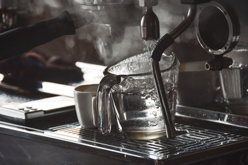 coffee machine making coffee in cafe