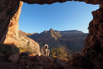 Hikers at the entrance to the Cave of Domes on Hoseshoe Mesa in Grand Canyon National Park, Arizona.