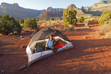 Backpacking couple in their tent in early morning on Horseshoe Mesa in Grand Canyon National Park, Arizona. © Francisco