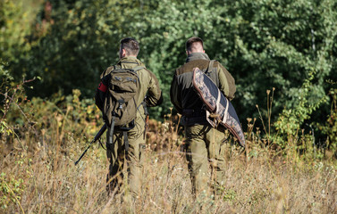 Army forces. Camouflage. Military uniform fashion. Friendship of men hunters. Hunting skills and...