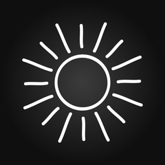 Doodle sun drawn on blackboard.