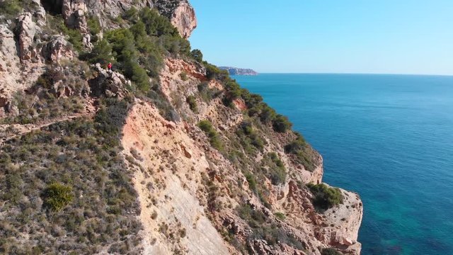 Cliffs in Llevant cove beach in Benitatxell, Alicante, Spain