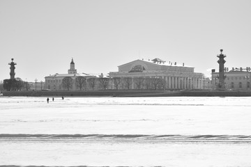 View of the arrow of Vasilievsky Island and frozen Neva river.