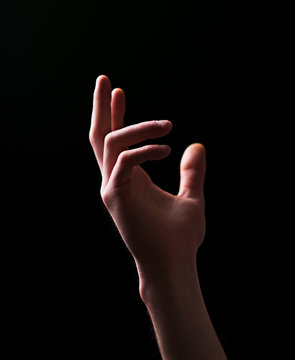 hand gesture isolated on black background