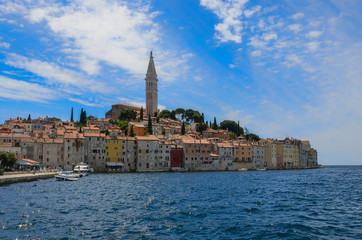 Fototapeta na wymiar Wonderful romantic old town at Adriatic sea. Boats and yachts in harbor at magical summer. Rovinj. Istria. Croatia. Europe.