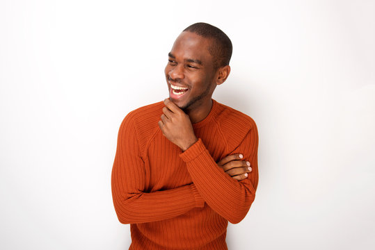 happy african american man laughing against white background