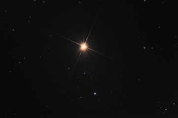 The Arcturus star in Boote constellation, called also apha Boo, taken with large diameter telescope...