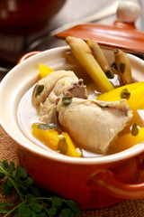 Chicken in Ginger and Lemongrass Broth in a pot. Tinolang Manok from Philipines.