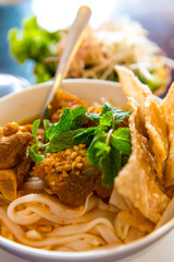 Tasty noodles in a white bowl. Vietnamese cuisine
