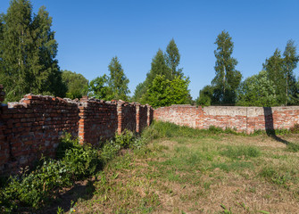 Abandoned brick fence.