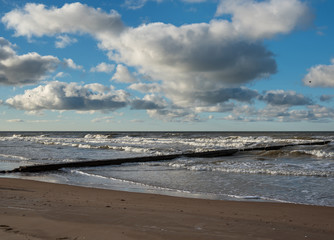 Wooden pier in sea.