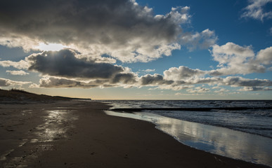 Wooden pier in sea.