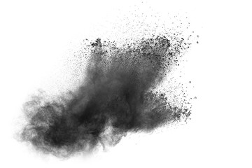 Black powder explosion against white background. Charcoal dust particles exhale in the air.