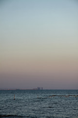 Obraz premium high-rise buildings on the sea horizon