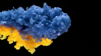Super slowmotion shot of color inks in water. Shot with high speed camera at 4K.