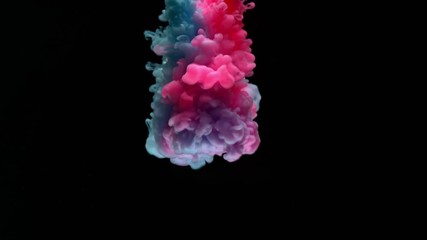 Super slowmotion shot of color inks in water. Shot with high speed camera at 4K.