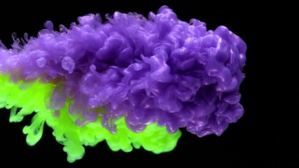 Super slowmotion shot of color inks in water. Shot with high speed camera at 4K.