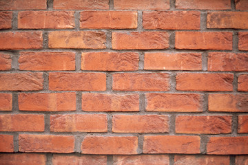 New brick wall. Vintage dilapidated cement brick wall grunge. Red brick wall cement texture background.New red brick wall  background.
