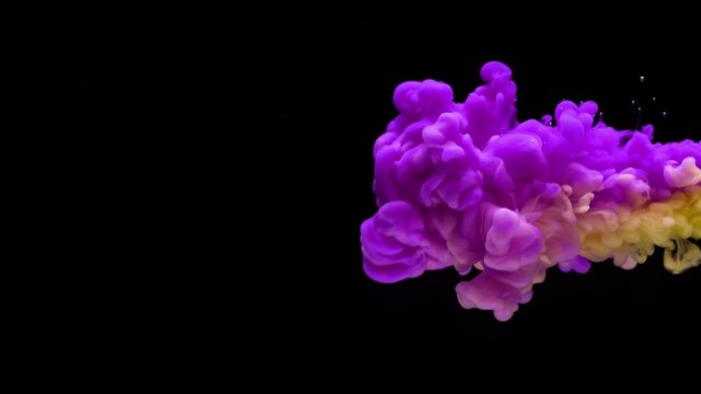Super slowmotion shot of color inks in water. Shot with high speed camera at 4K.
