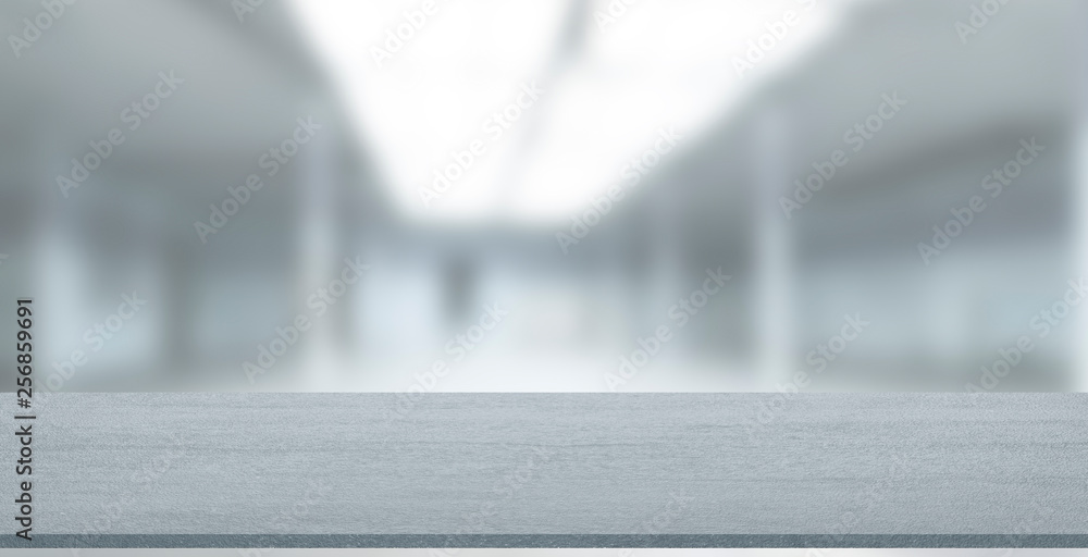 Wall mural empty stone table with blurred soft light factory business background. product display template. moc