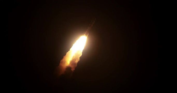 Spectacular nighttime shot of a space Rocket spewing fire and flames as it flies into space carrying a GPS satellite into low earth orbit at night. 4K Slow-motion with audio.