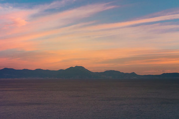 summer landscape sea and mountain at sunset with copy space