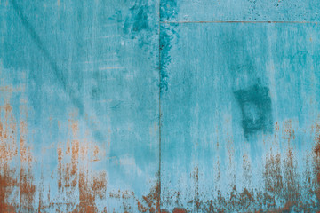Rust on metallic surface. Iron texture. Partly rusty background. Rough oxide plate close-up. Hard decay of metal. Oxidation of steel. Chemical reaction. Partially rusted metal panel with peeling paint - obrazy, fototapety, plakaty