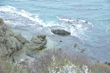 waves crashing  on rocks