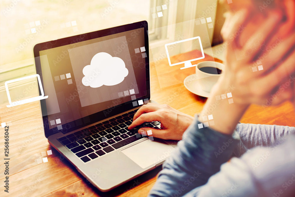Poster cloud computing with man using a laptop computer