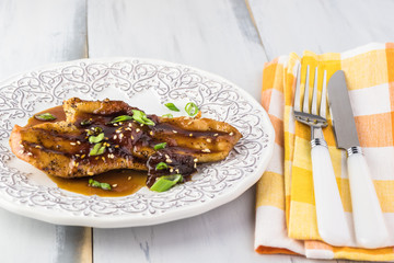 Homemade roasted chicken breast with apricot jam.