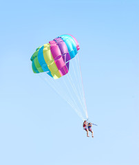 Fly a parachute over the sea, paraglider flying over the sea