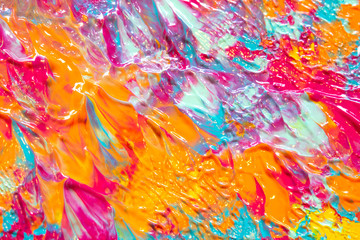 Pink Blue and Orange Paint Splatters on White Background