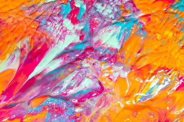 Pink Blue and Orange Paint Splatters on White Background