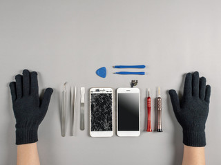 Technician or engineer prepairing to repair and replace new screen broken and cracked screen...