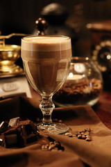 glass of Coffee on wooden table