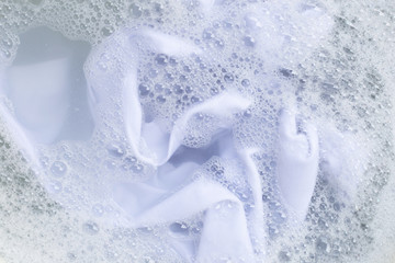 Soak a cloth before washing, white cloth