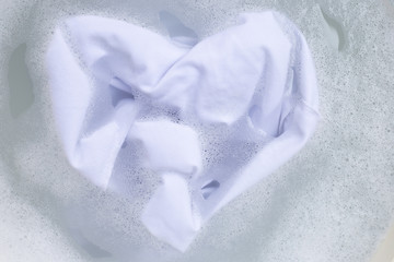 Soak a cloth before washing, white cloth, Heart shape