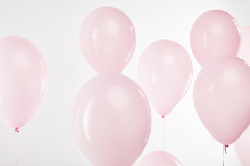 background with decorative floating pink air balloons on white