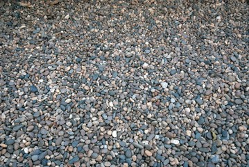 Stones construction rocks.Grey granite gravel texture background.