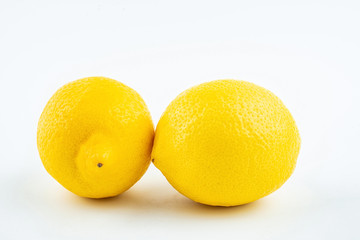 Fresh yellow lemon on white background