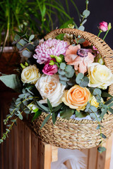 bouquet of lilac, rose, Narcissus, hyacinth, Ranunculus, Tulip, Bush rose, chrysanthemum, eucalyptus, animon, peony in a floral shop
