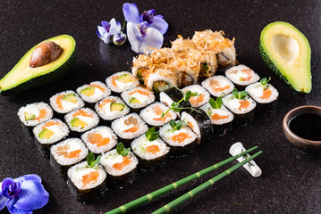 Rainbow Sushi Roll with salmon, eel, tuna, avocado, royal prawn, cream cheese Philadelphia