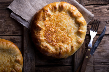 Set of Georgian and Adjarian Khachapuri Dishes on Black Rustic Background Top View. Homemade Ajarian Khachapuri, Megrelian and Grilled Khachapuries with Cheese Close Up Collection