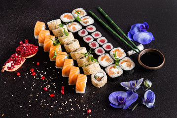Rainbow Sushi Roll with salmon, eel, tuna, avocado, royal prawn, cream cheese Philadelphia