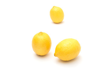 Ripe lemons on a white background, citrus fruits