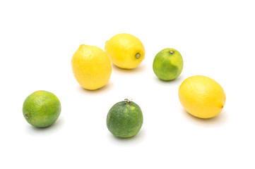 Ripe lemons and lime on a white background, citrus fruits