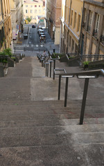 Fototapeta na wymiar long stairways in the city of Lyon in France