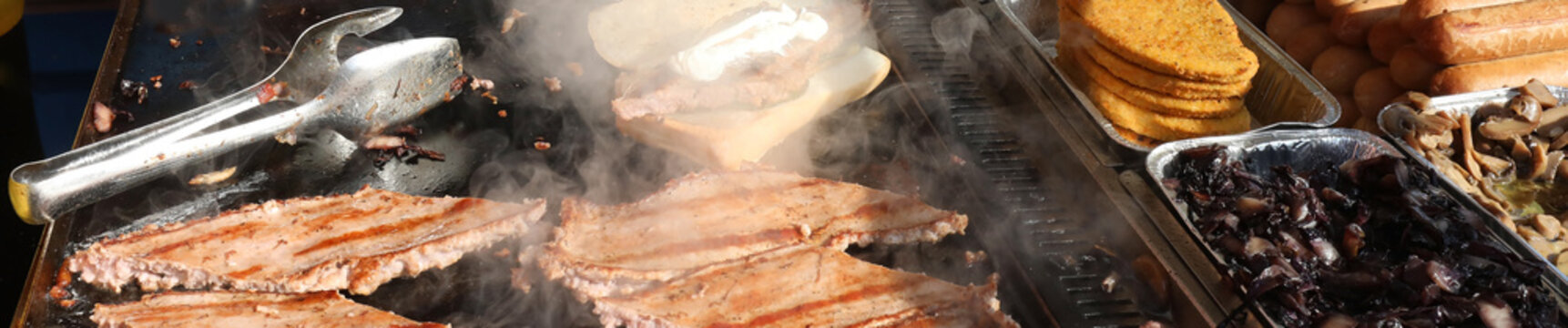 cooked sausages in the kiosk of street food