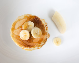 Banana pancakes and maple syrup © James Pearsell