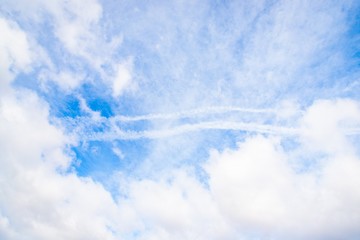 Beautiful white cirrocumulus and fluffy clouds on a sky background. Blue sky with clouds
